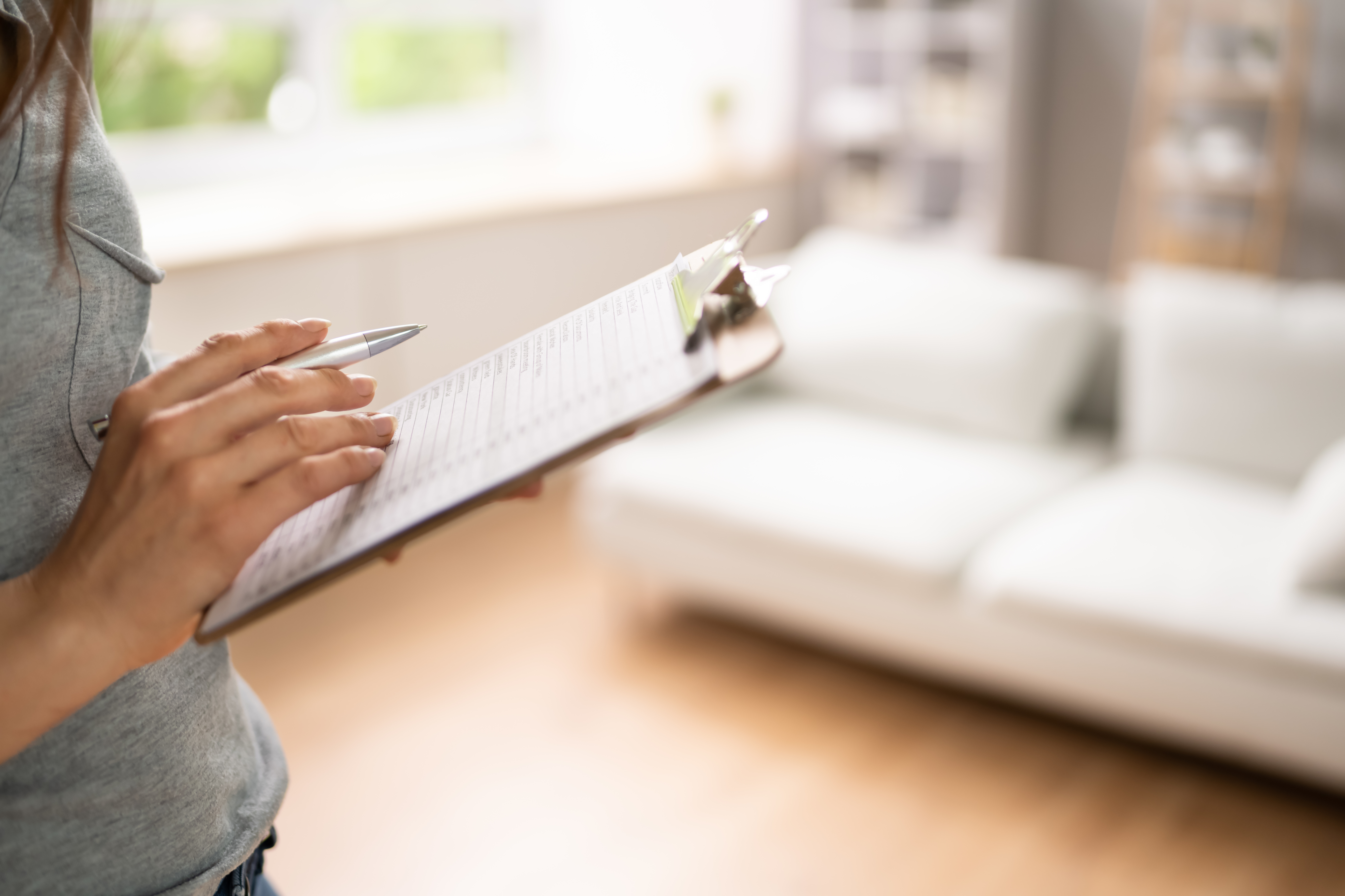 a person holding a clipboard